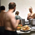 The Warriors of NS on shirtless kitchen duty