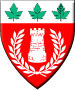 Castel Rouge - Blazon: Gules, a tower within a laurel wreath, and on a chief argent three maple leaves vert